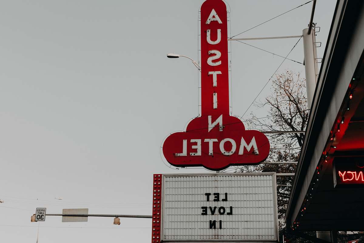 sign Austin Motel Let Love in signage austin